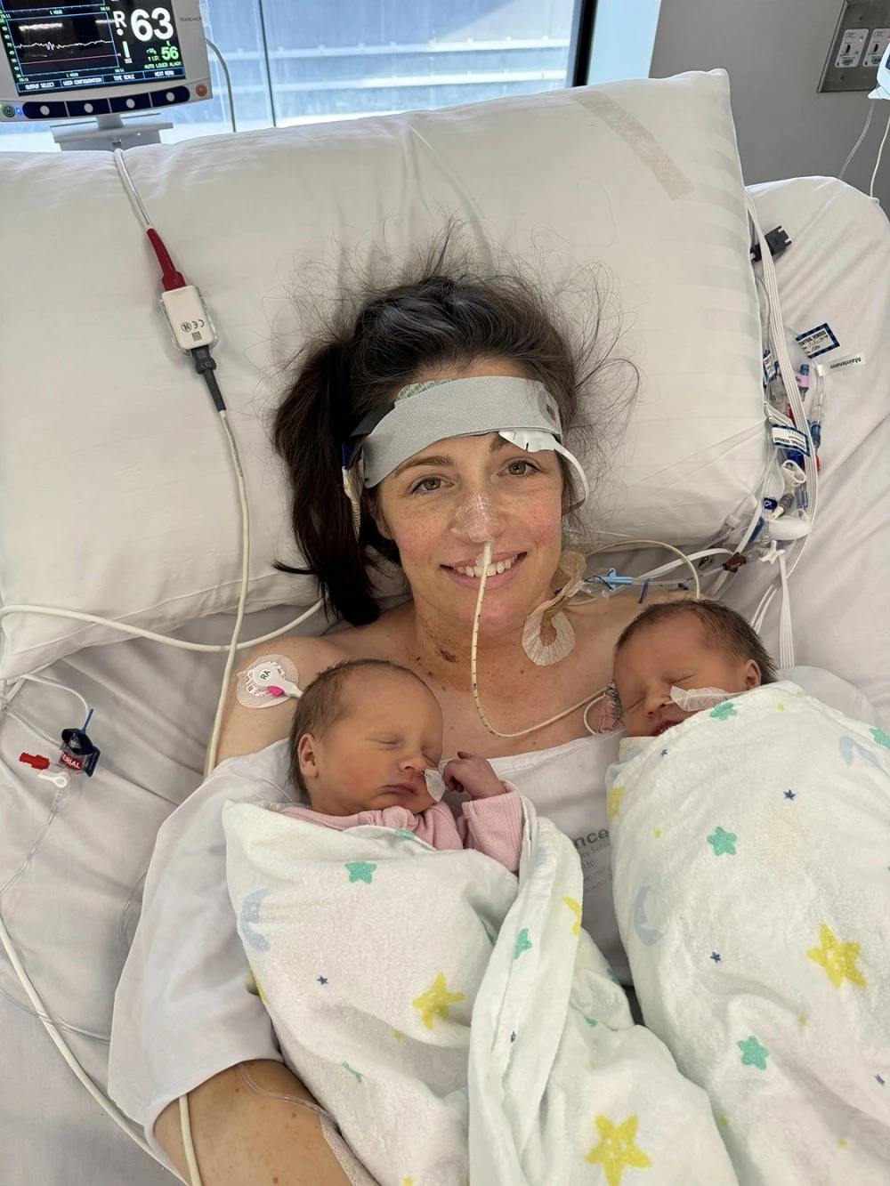 Alex Judd with twins