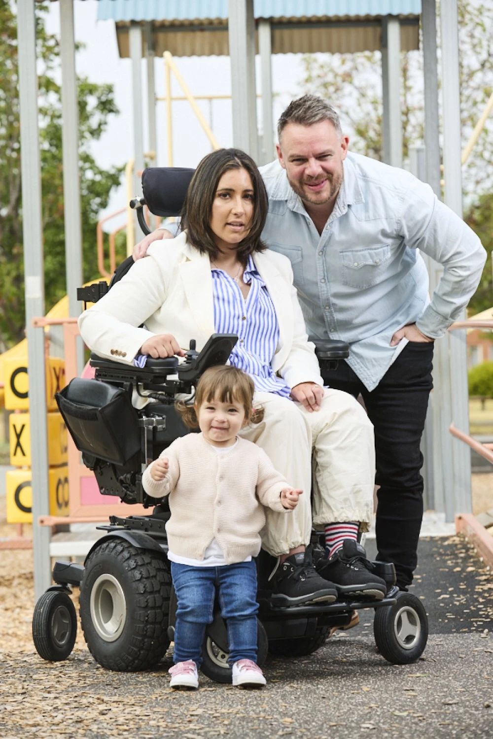 Brianna with husband and child