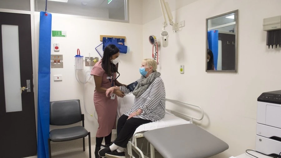 Diabetes and Endocrinology doctor in clinic with patient