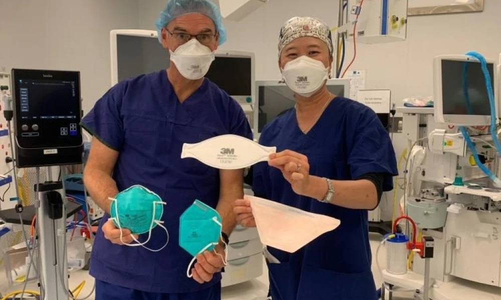 Dr Daryl Williams and Dr Irene Ng with N95 face masks