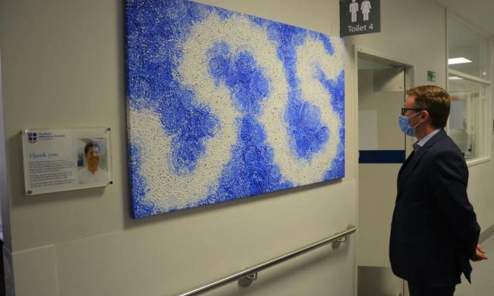 ED Director Mark Putland with artwork donated to the RMH ED
