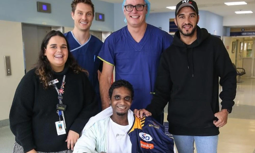 Gavin Butt with medical team and West Coast AFL player Jamie Bennell