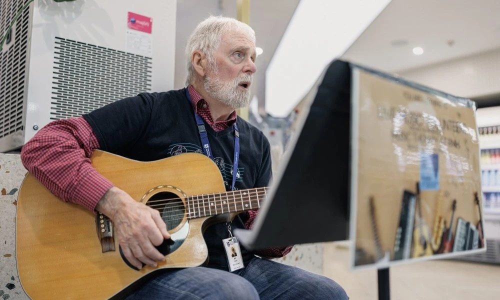 live-music-volunteer-playing-guitar-and-singing.jpg