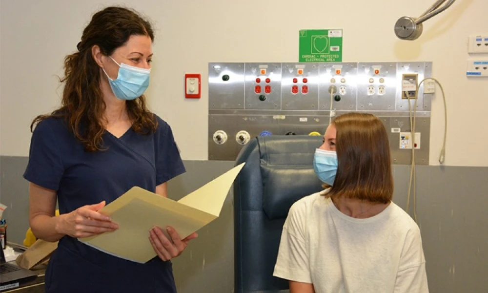 Lucy Lee in BANDIT clinical trial with staff member