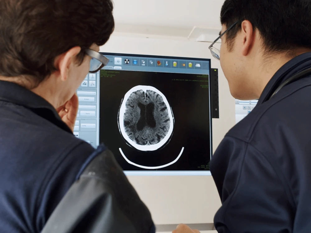 Neurology and Stroke medical staff viewing image of brain
