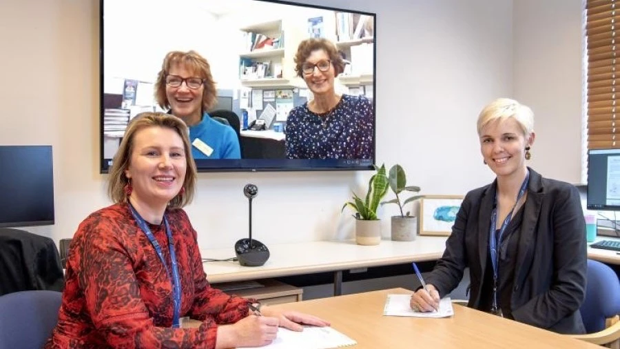 BRIGHT-YOD neuropsychiatry staff in meeting room video conference