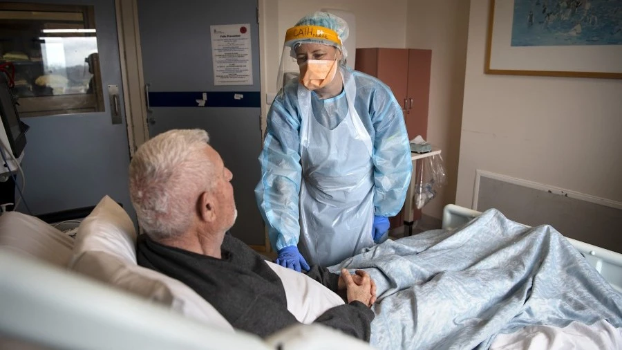 VIDS Nurse Cath caring for patient with COVID-19