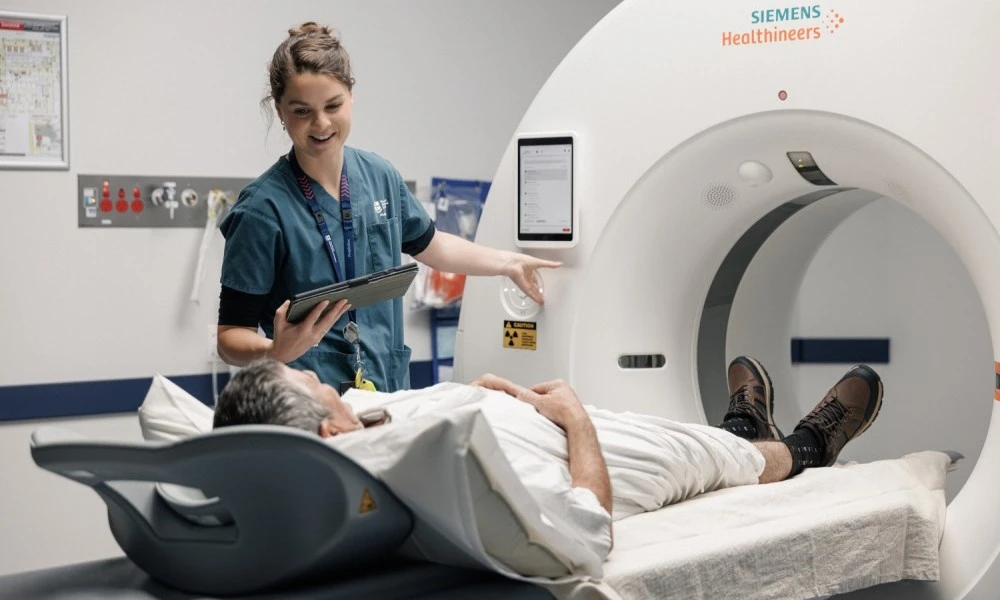 radiology-staff-member-provides-imaging-scan-to-patient.jpg