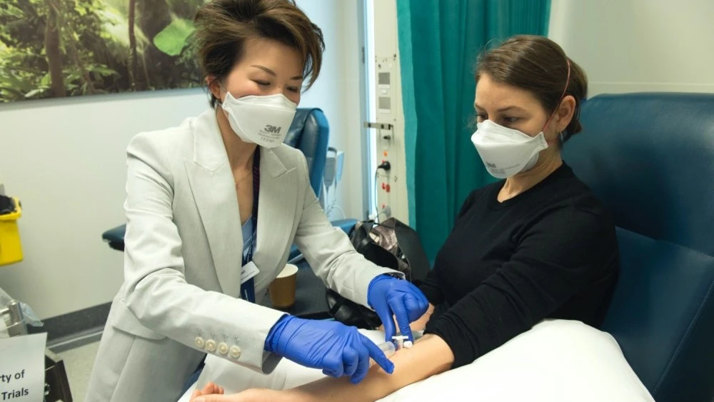 Research nurse assisting patient in Clinical Trials Centre