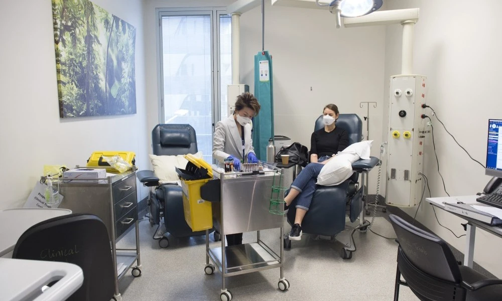 Diabetes and Endocrinology research nurse with patient in Clinical Trials Centre