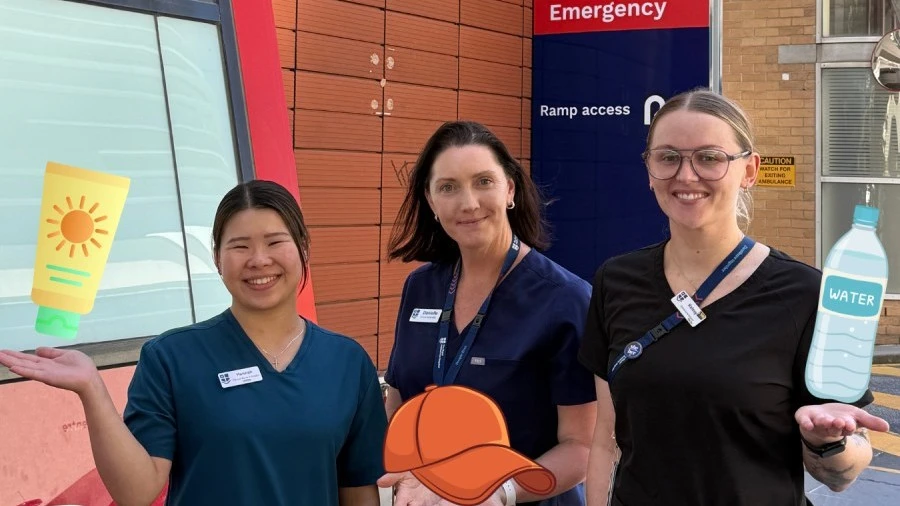ED staff Hannah, Danielle and Kelsey pose with sunscreen, hat and water emojis outside the RMH Emergency Department