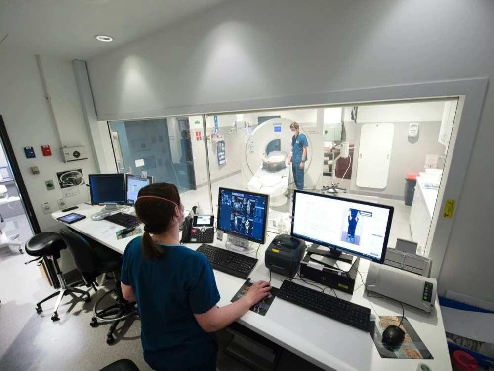 Technicians scanning a patient in Medical Imaging