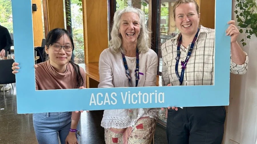 Three women holding sign that says Listen to older people - ACAS Victoria