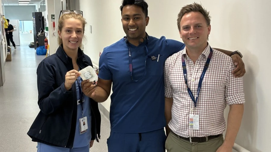 Alex, Brendon and Ben with monitoring device used in Virtual Ward pilot