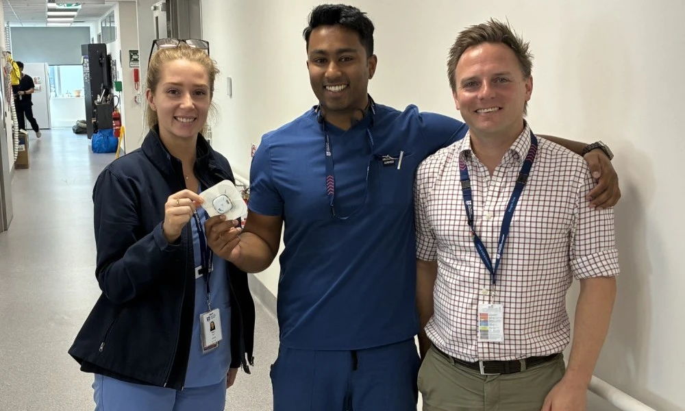 Alex, Brendon and Ben with monitoring device used in Virtual Ward pilot