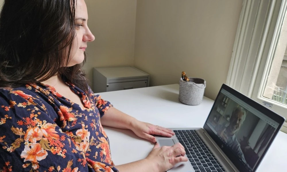 Woman in telehealth video appointment