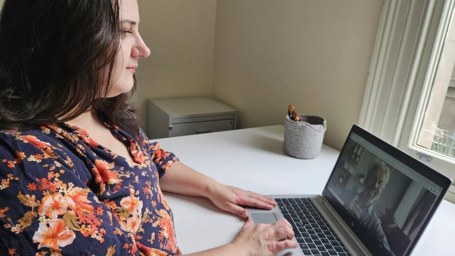 Woman in telehealth video appointment
