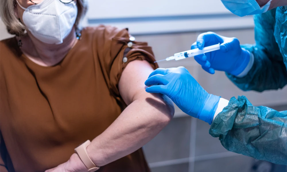 Woman receiving vaccination