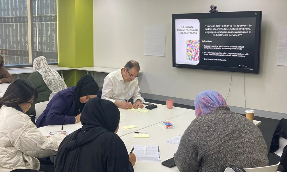 Community Engagement Strategy workshop participants writing reflections