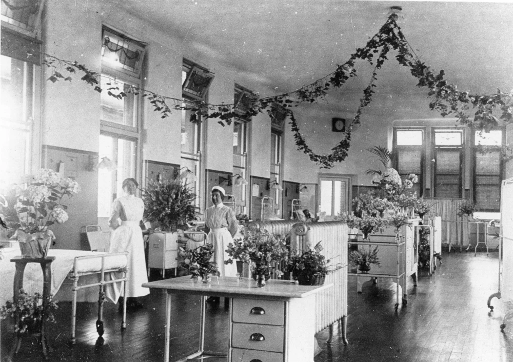A ward decorated for Christmas circa 1920